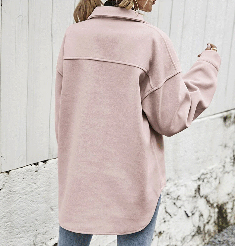 Veste courte ample à poches boutonnées