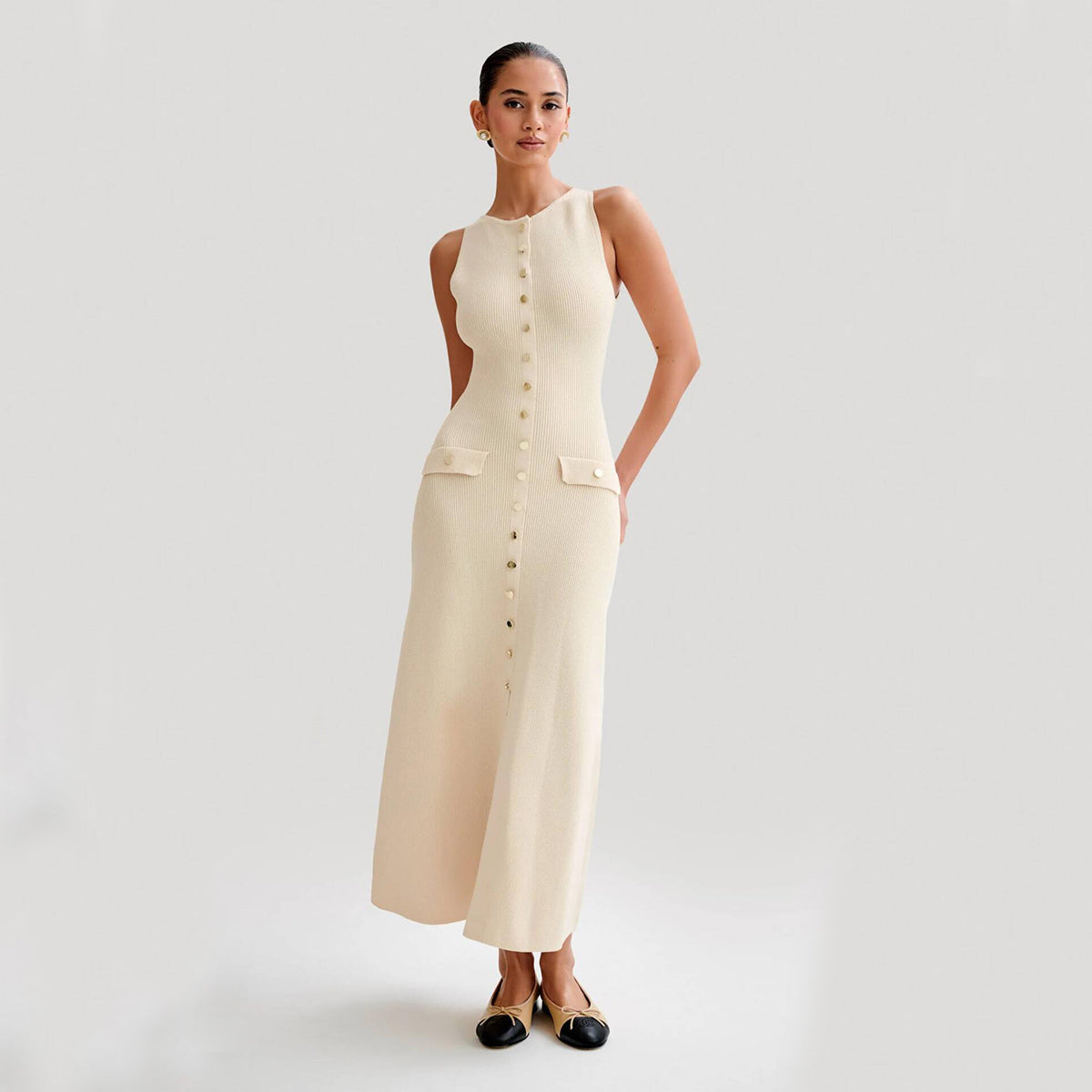 Robe longue en maille boutonnée sans manches