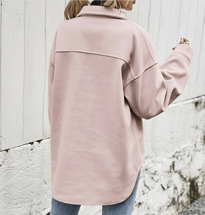 Veste courte ample à poches boutonnées
