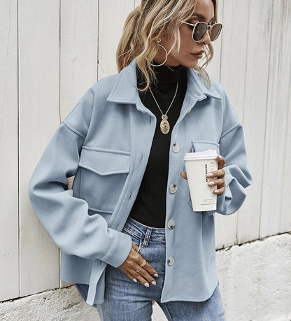 Veste courte ample à poches boutonnées