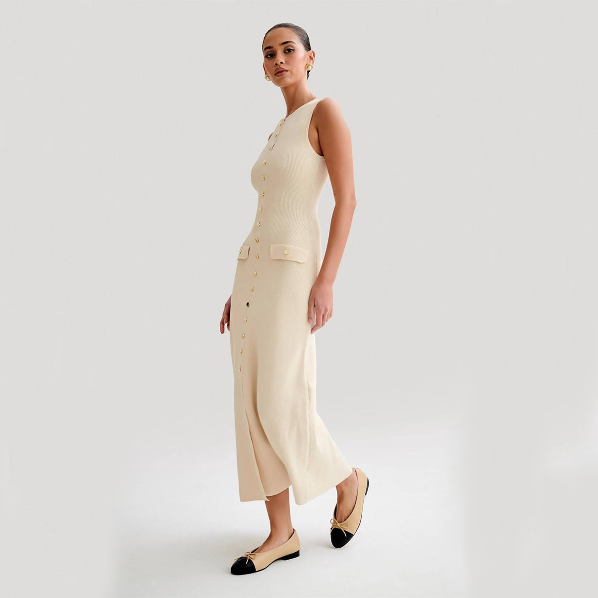 Robe longue en maille boutonnée sans manches